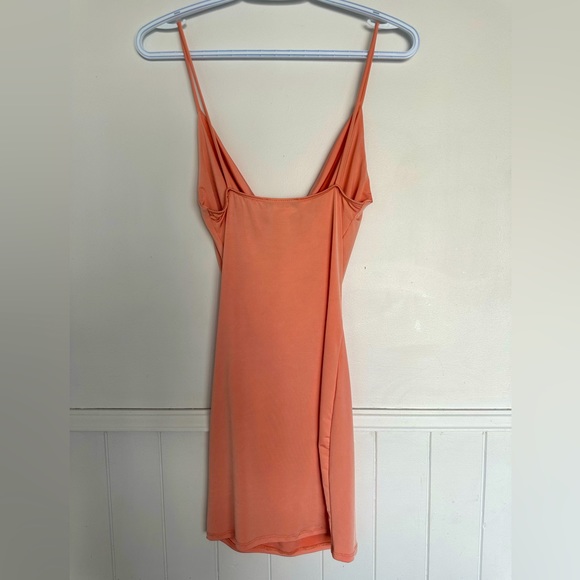 Body con light pink / salmon color dress. Size Small. - Picture 3 of 5